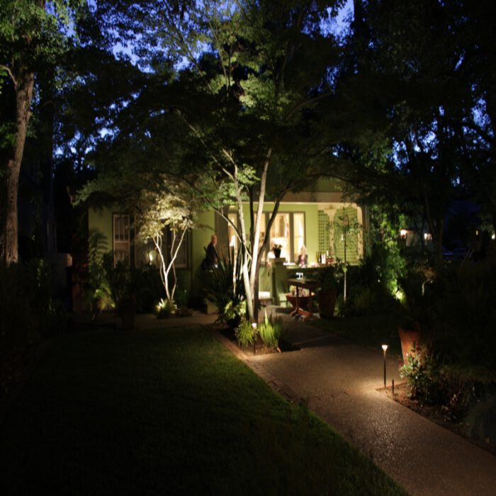 an image of outdoor residential landscape lighting